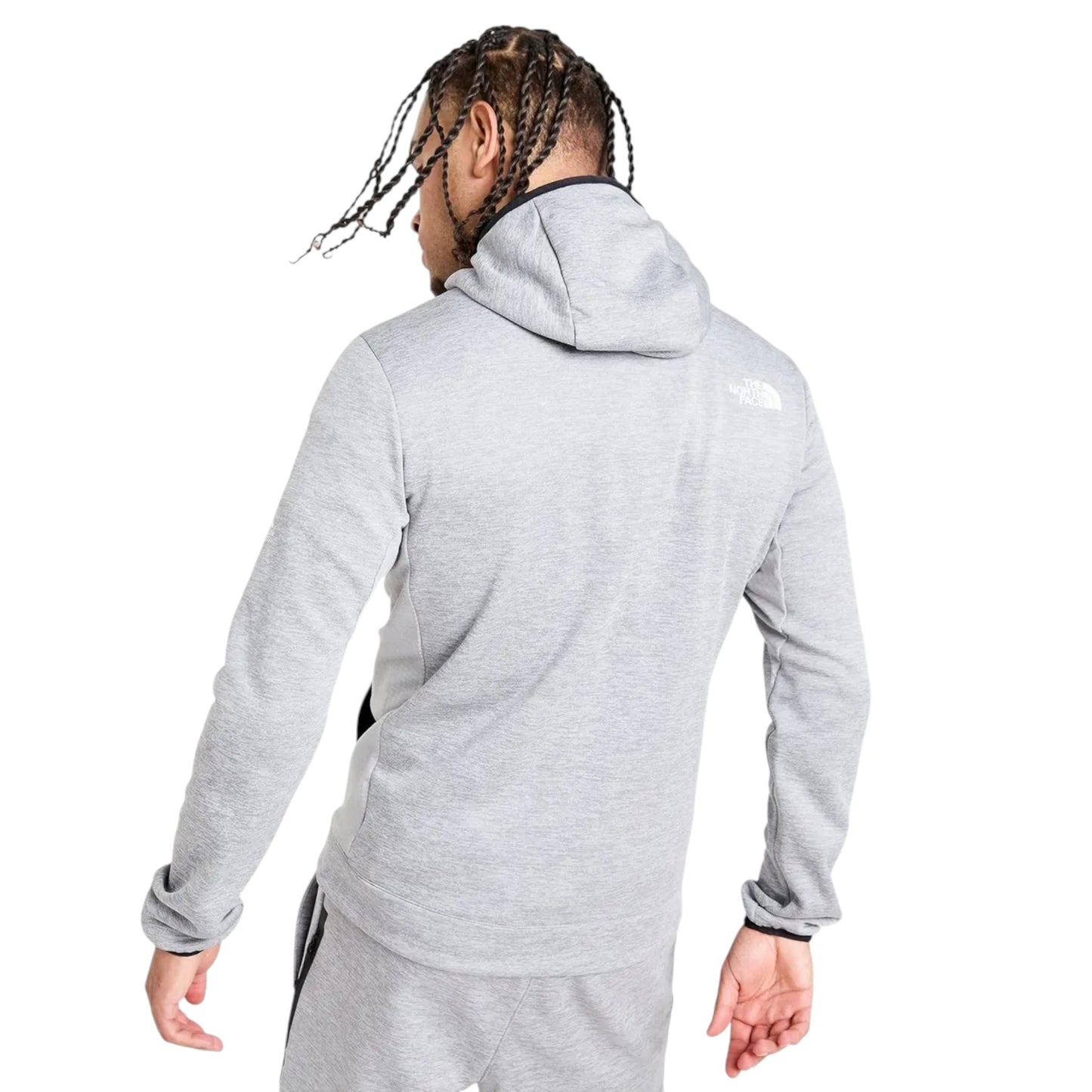 Person wearing a gray hoodie with a brand logo on a white background