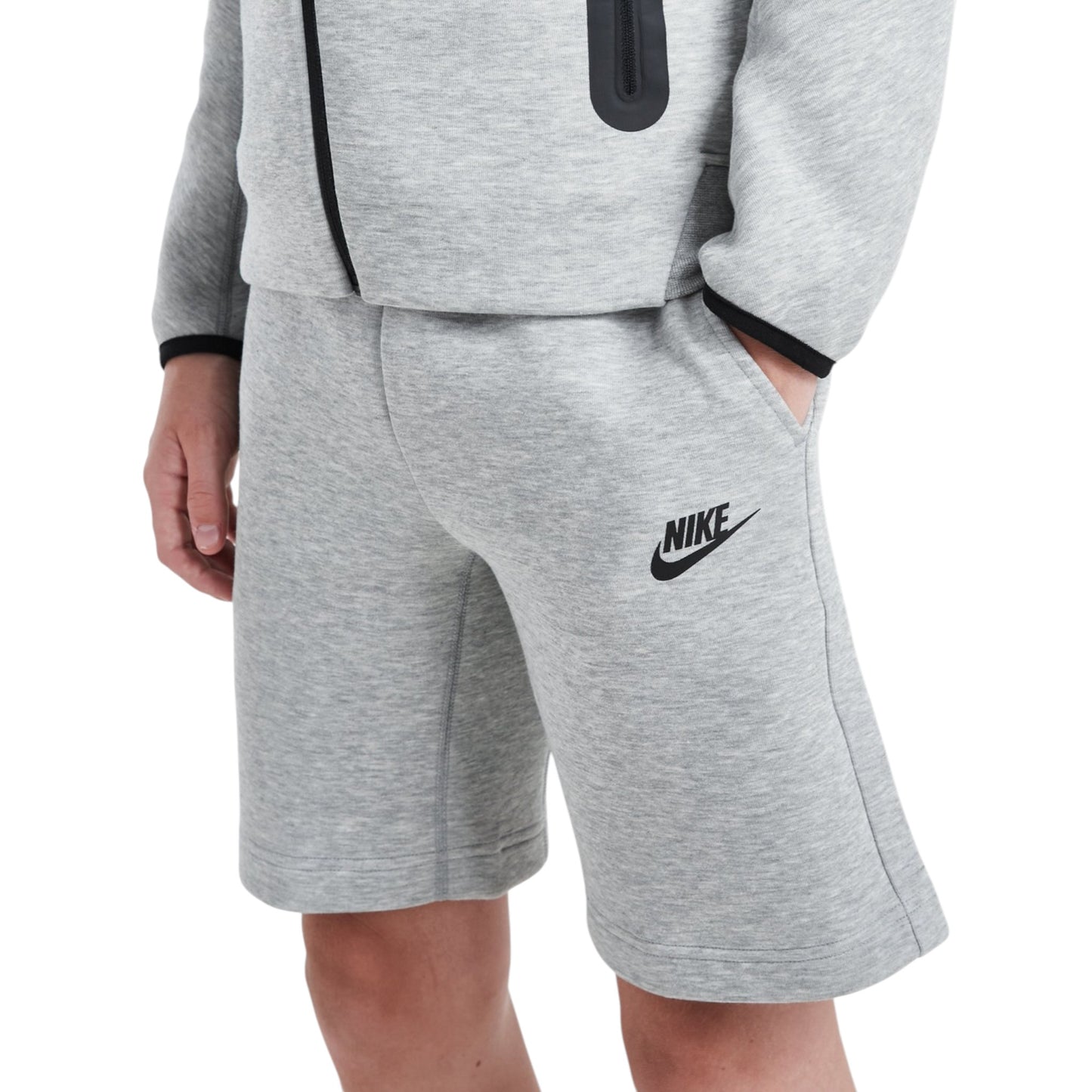 Gray Nike shorts with a black logo on a white background