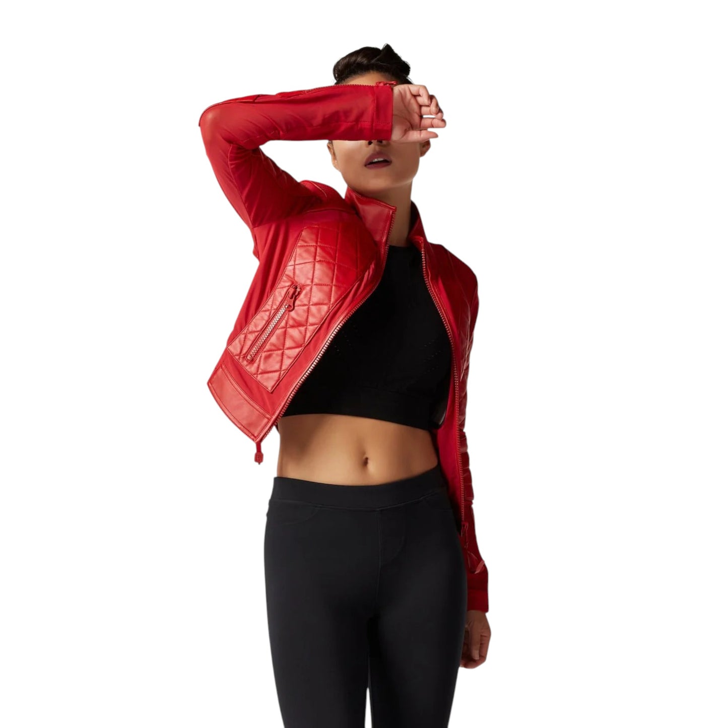 Person wearing a red quilted jacket over a black outfit on a white background
