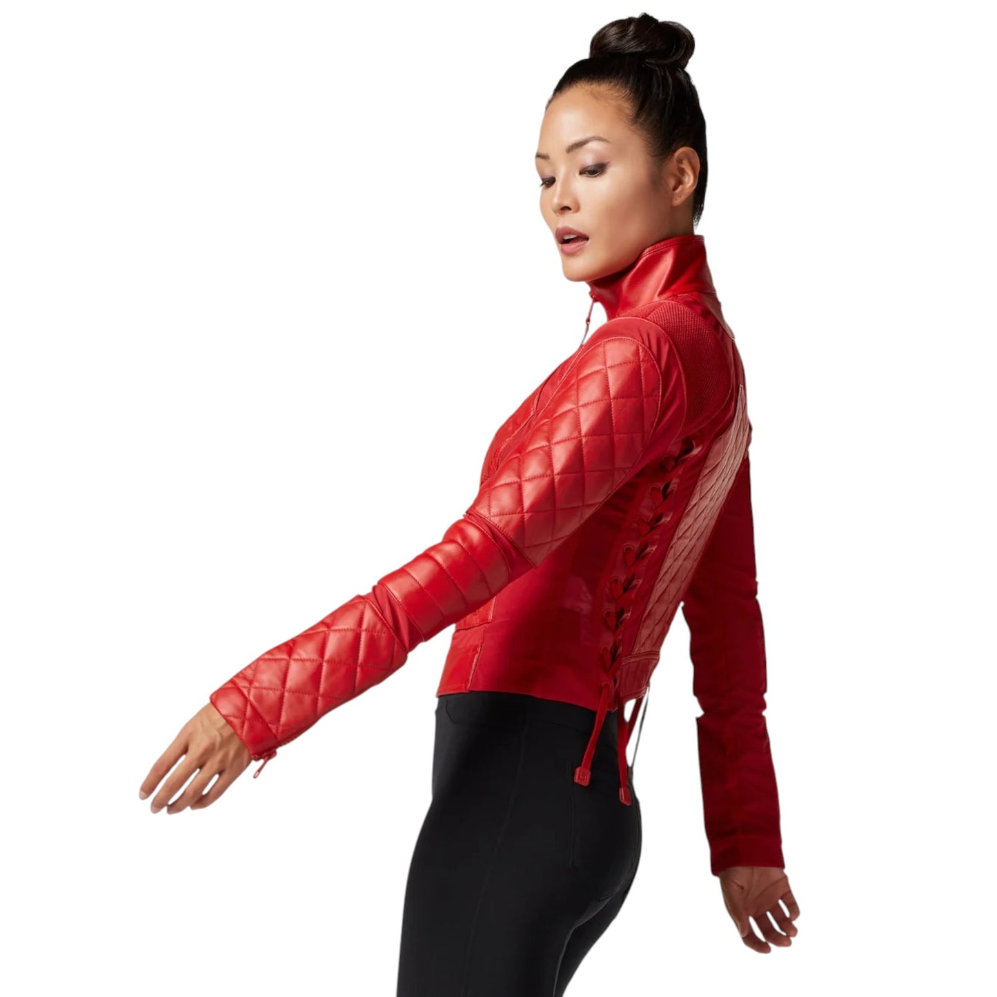 Woman wearing a red quilted jacket on a white background