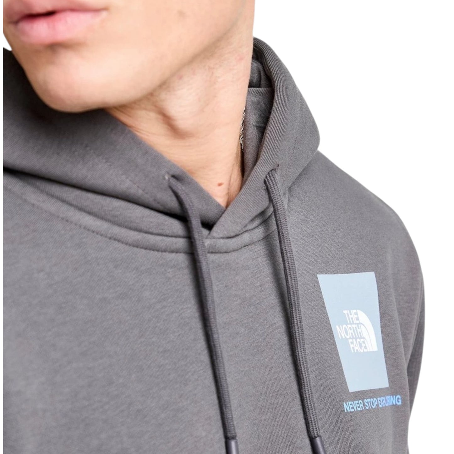Gray hoodie with a logo on the chest against a white background