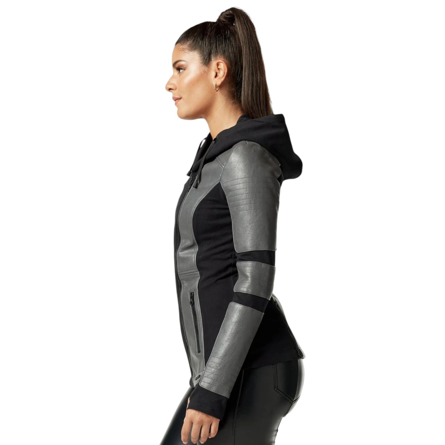 Person wearing a futuristic black and gray jacket on a white background