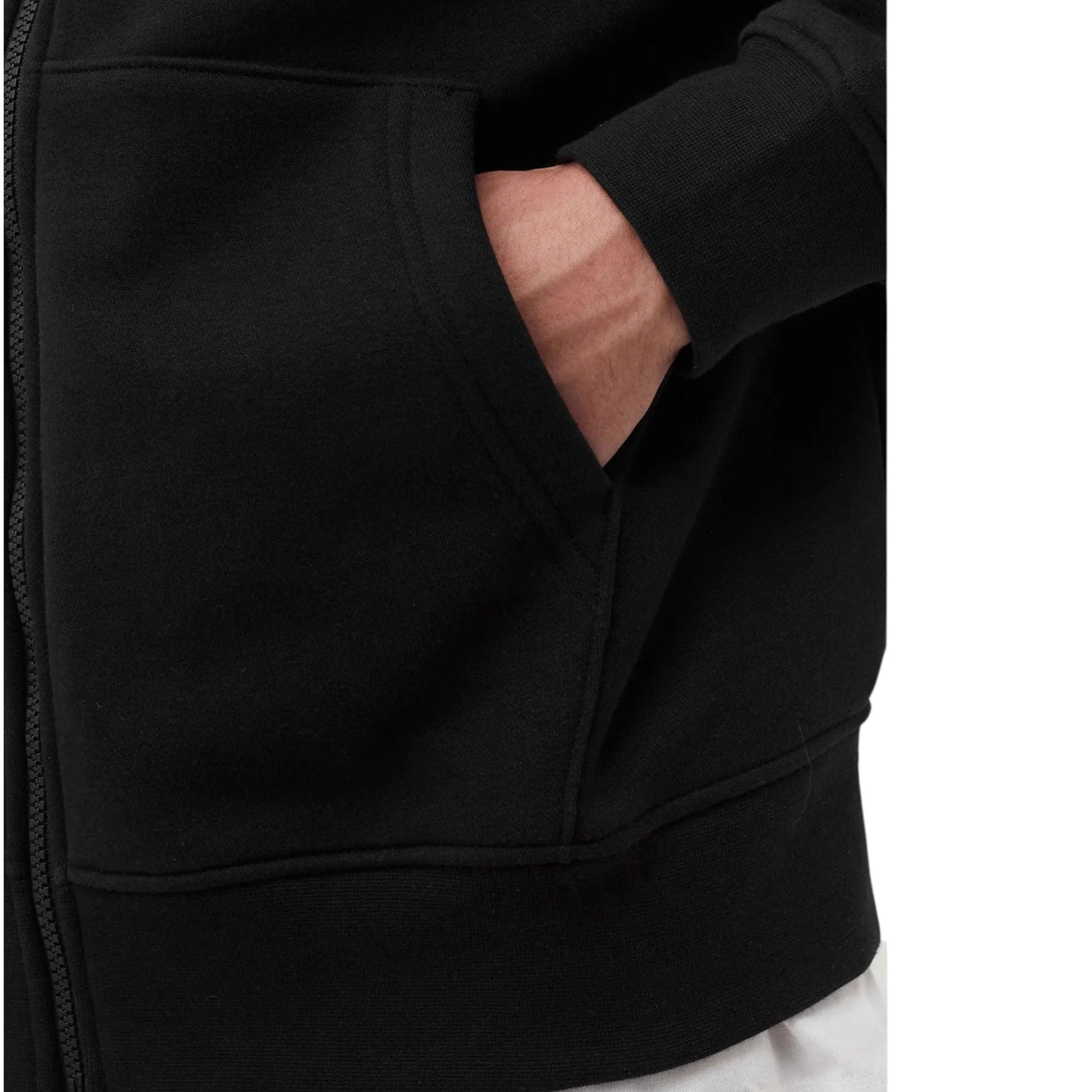 Close-up of a black hoodie with a pocket and sleeve.