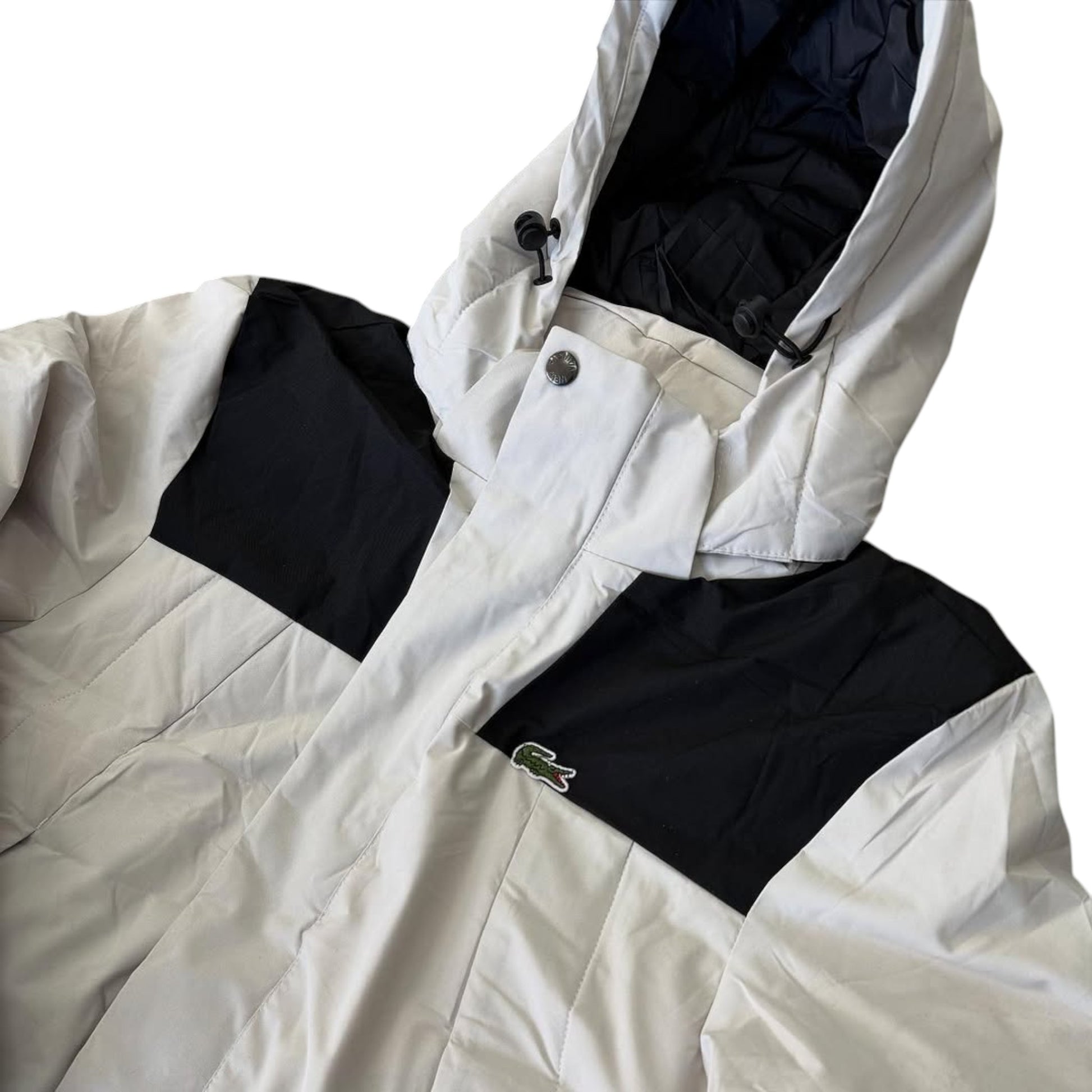 White jacket with black accents and a visible brand logo on a white background