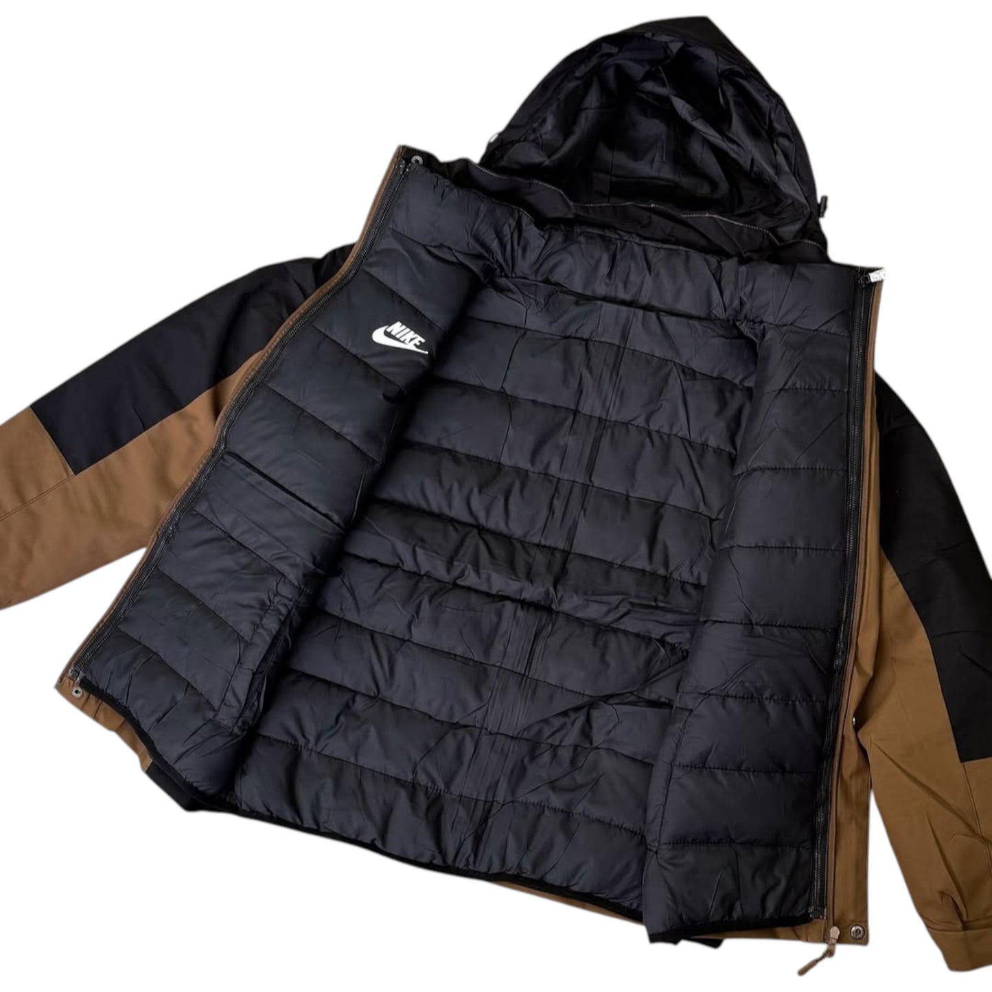 Black and brown puffer jacket with Nike logo on a white background