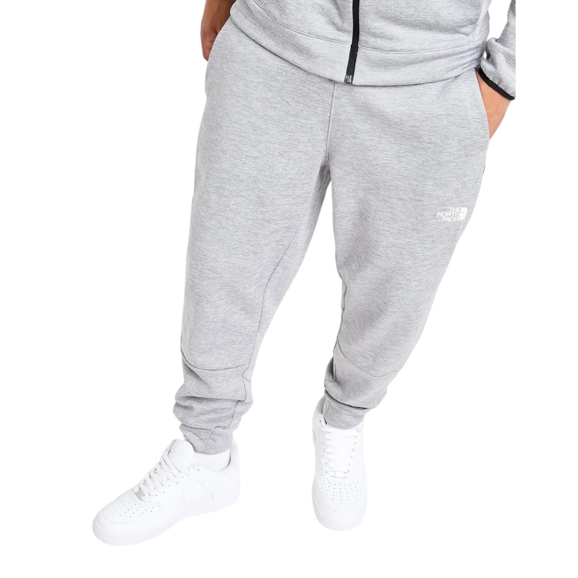 Gray jogger pants with a brand logo on a white background