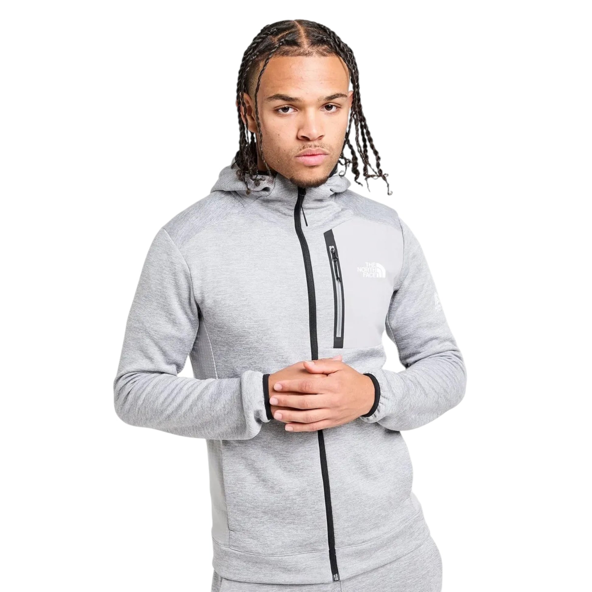 Person wearing a gray hoodie with a brand logo on a white background