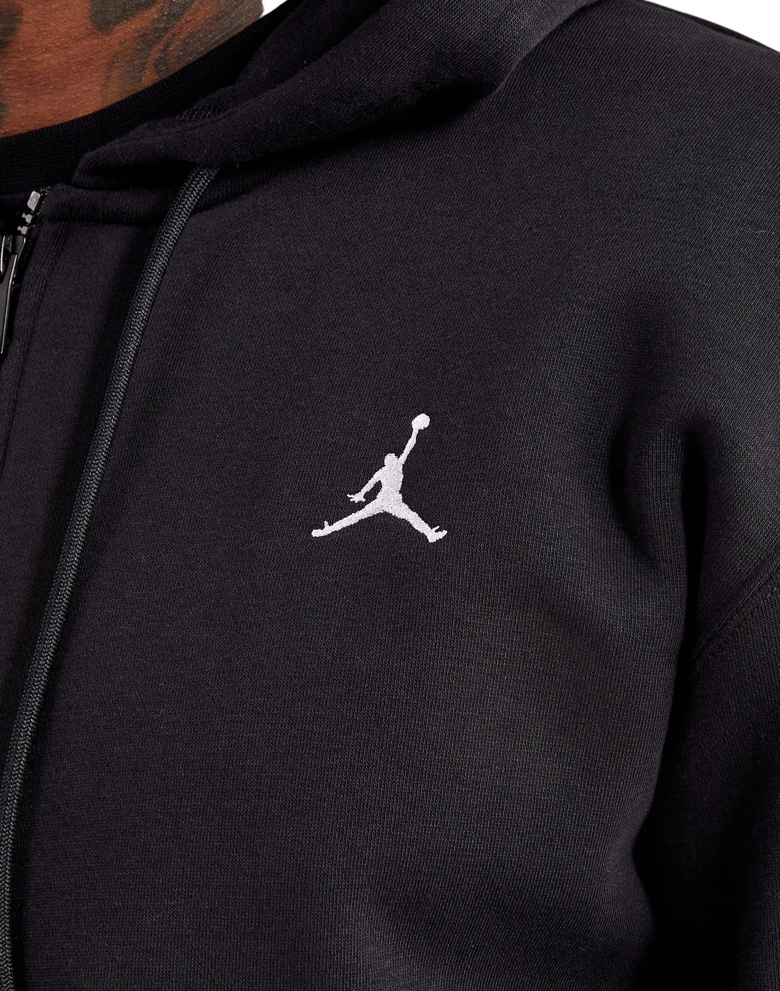 Black hoodie with a white logo on the chest