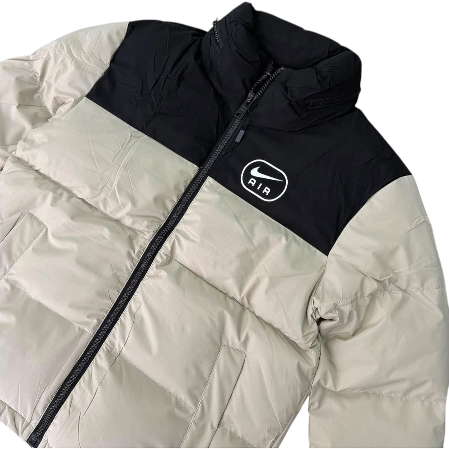 Puffer jacket with a black hood and visible brand logo on a white background