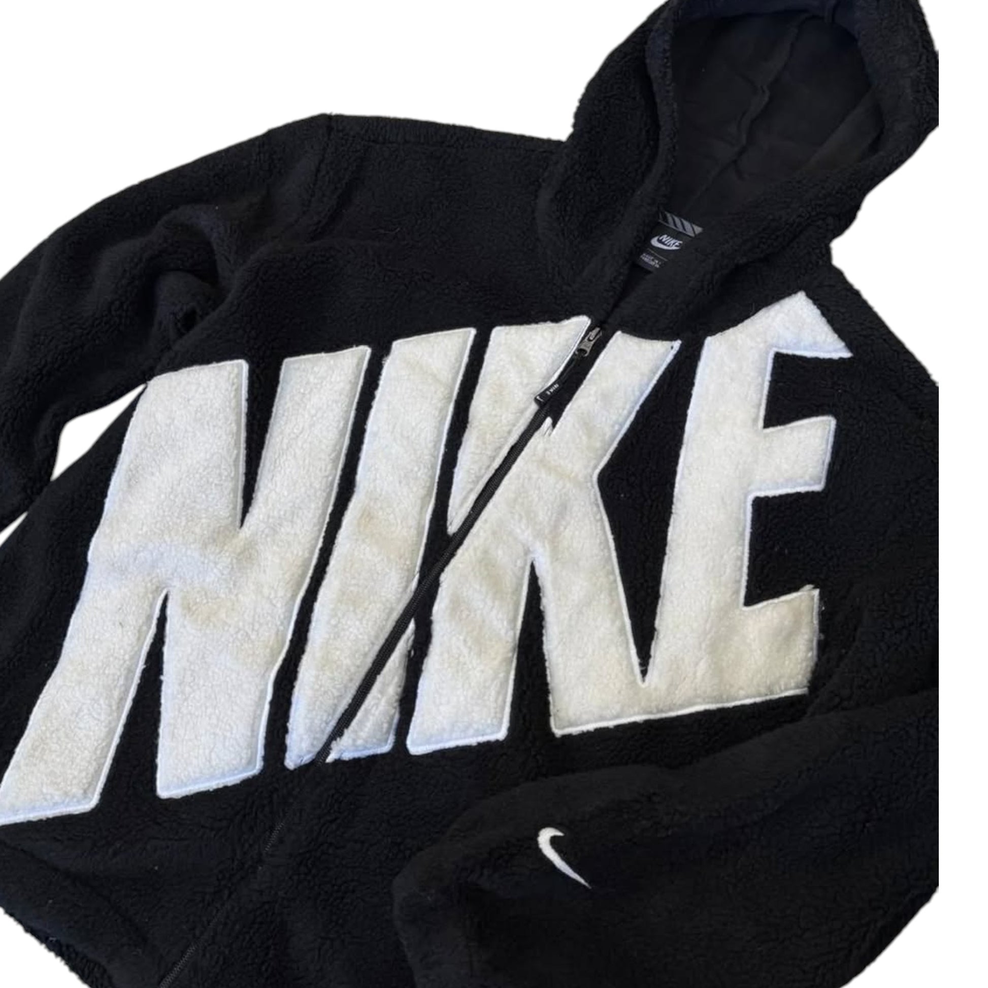 Black hoodie with large white 'Nike' logo on a white background