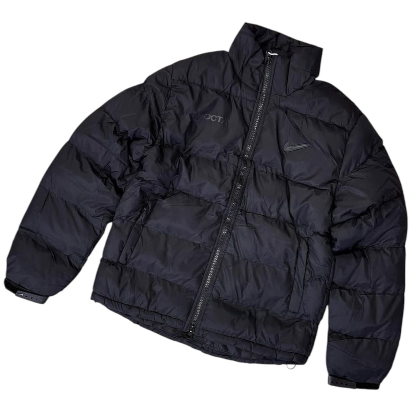 Black puffer jacket with visible branding on a white background