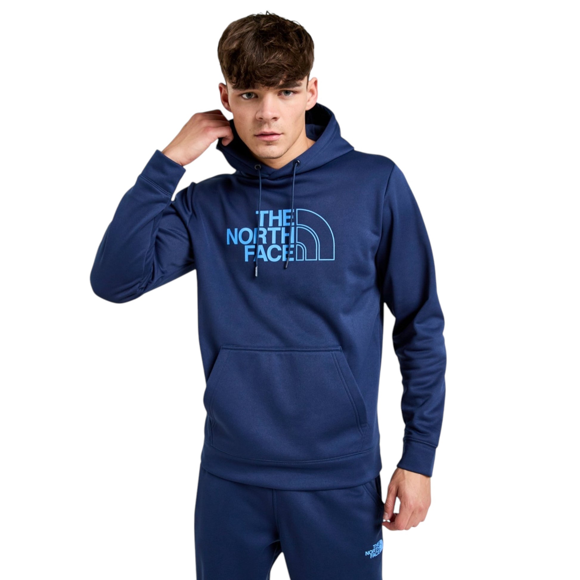 Person wearing a blue The North Face hoodie on a white background