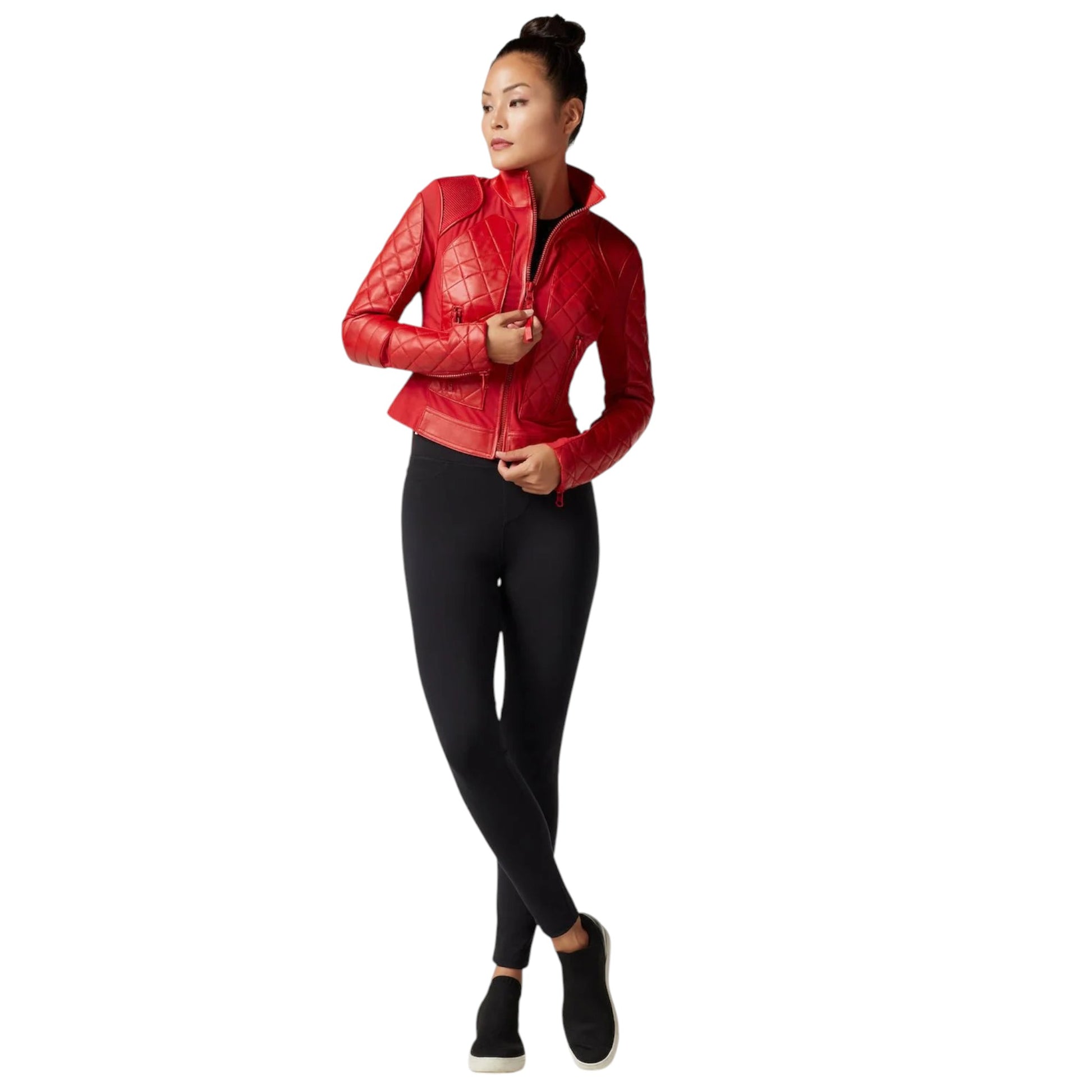 Person wearing a red quilted jacket and black leggings on a white background