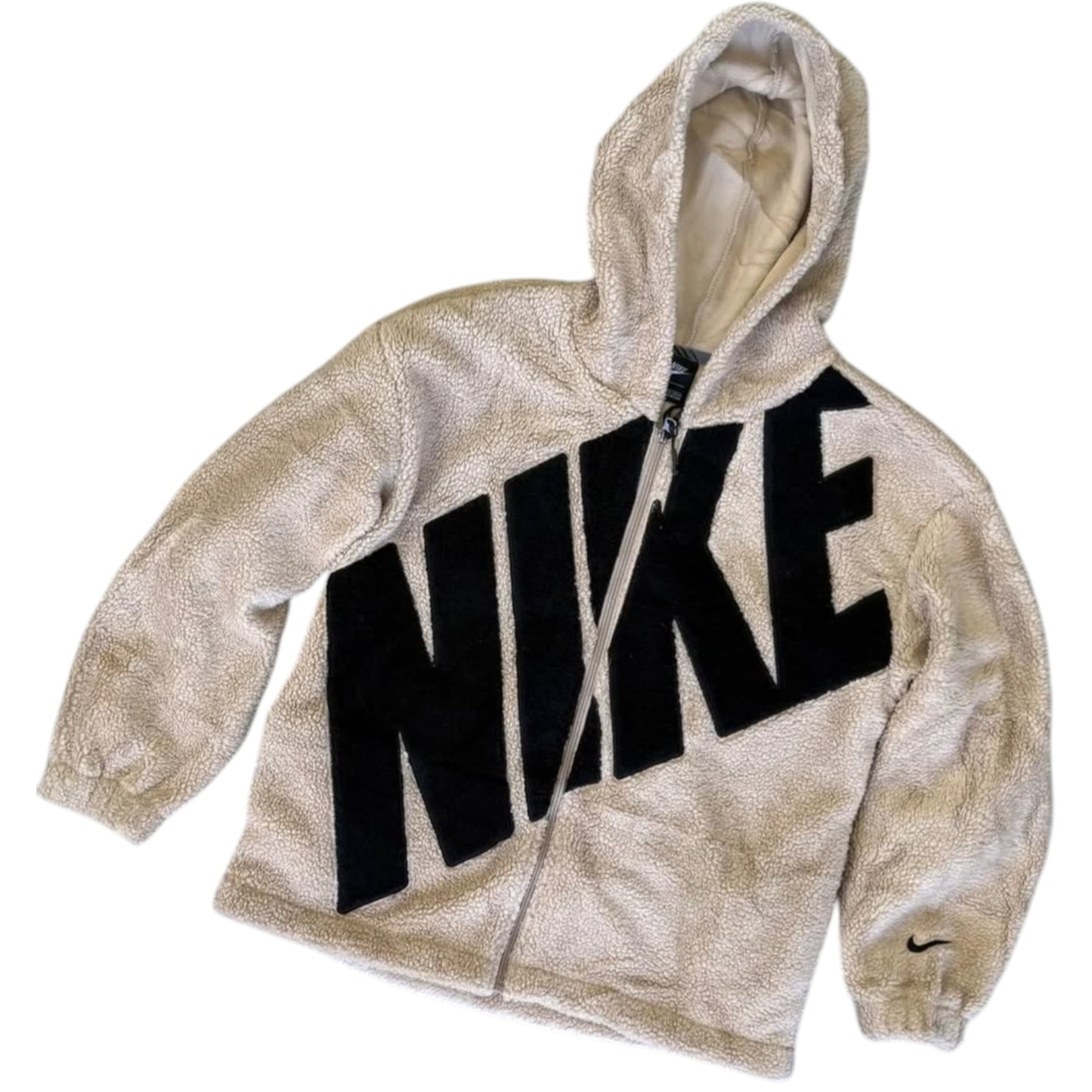 Beige hoodie with black 'Nike' logo on a white background