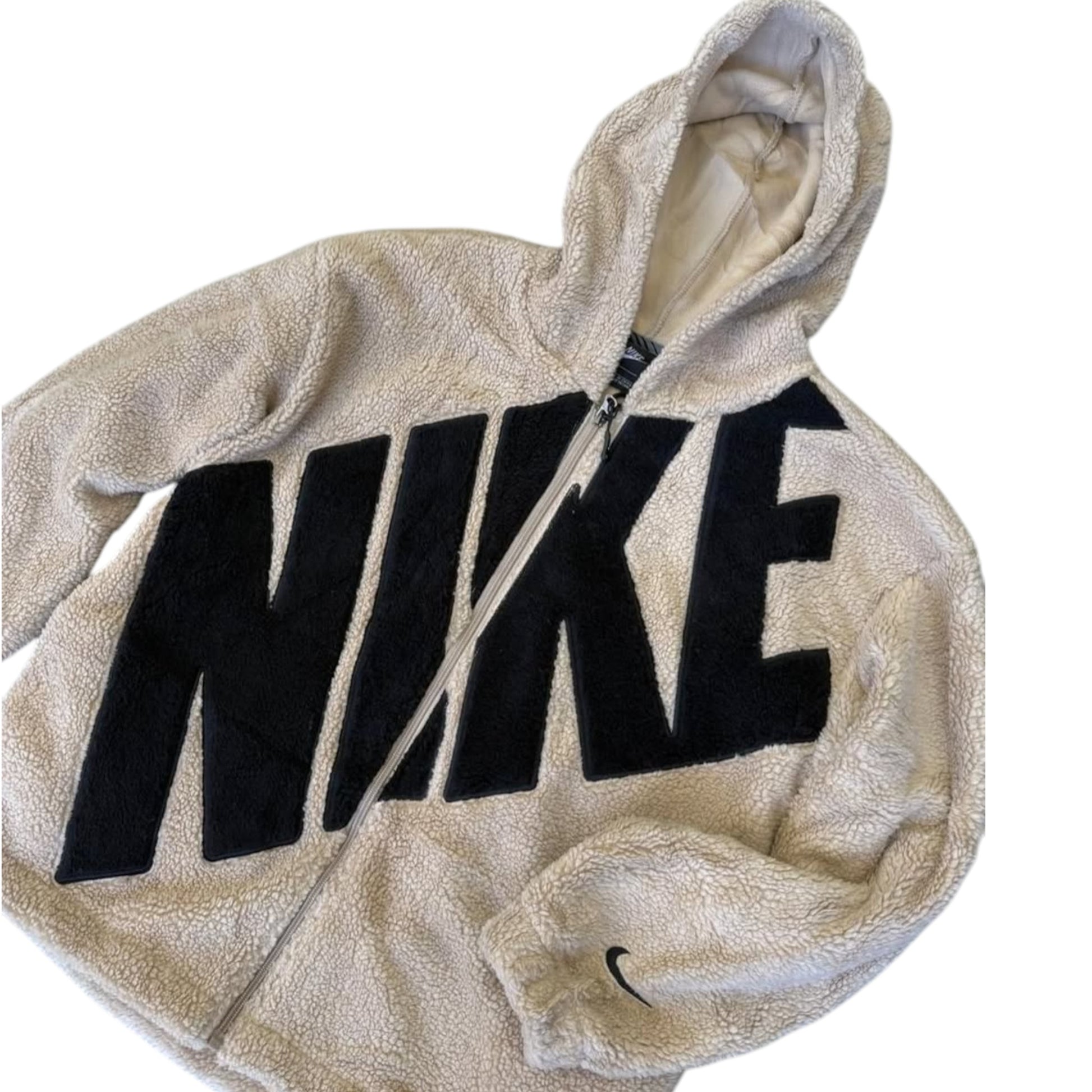 Beige hoodie with black 'Nike' logo on a white background