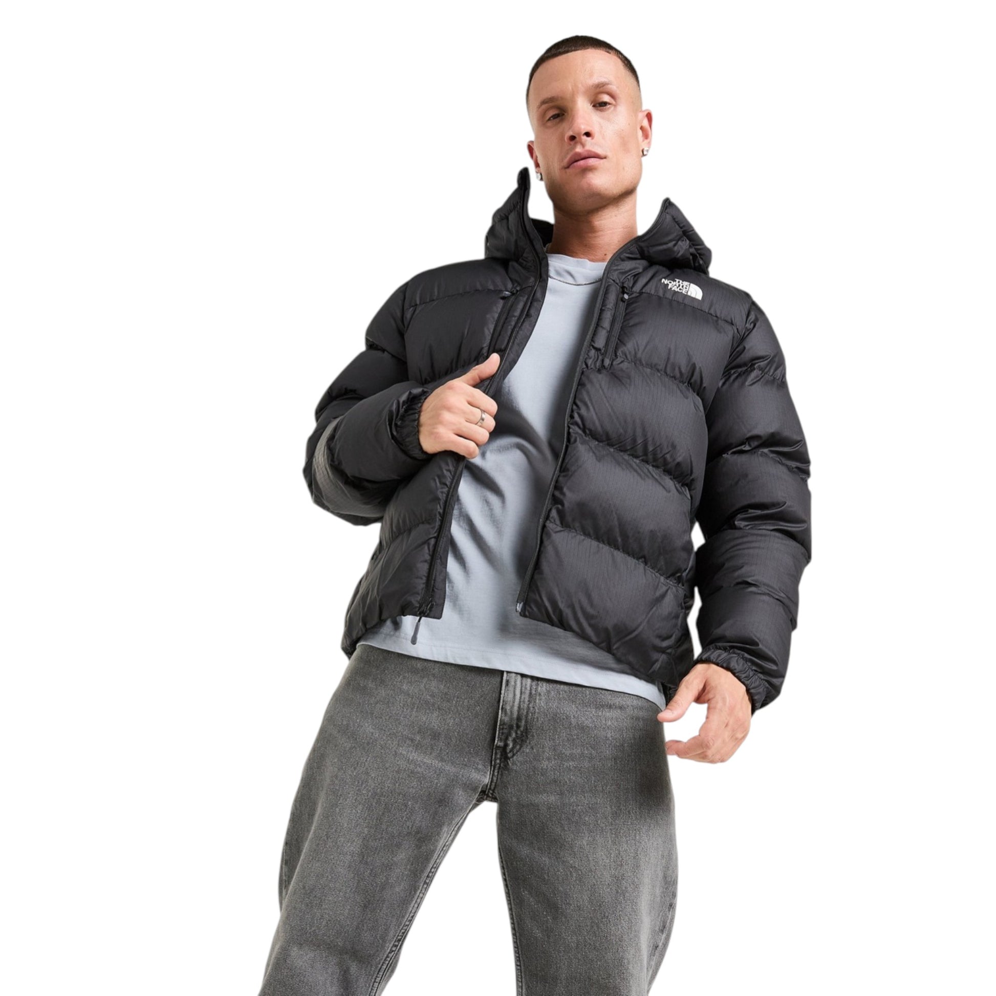 Man wearing a black puffer jacket on a white background