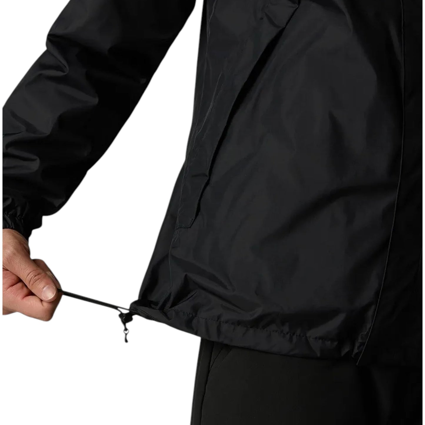 Person wearing a black raincoat with a close-up of the zipper on a white background