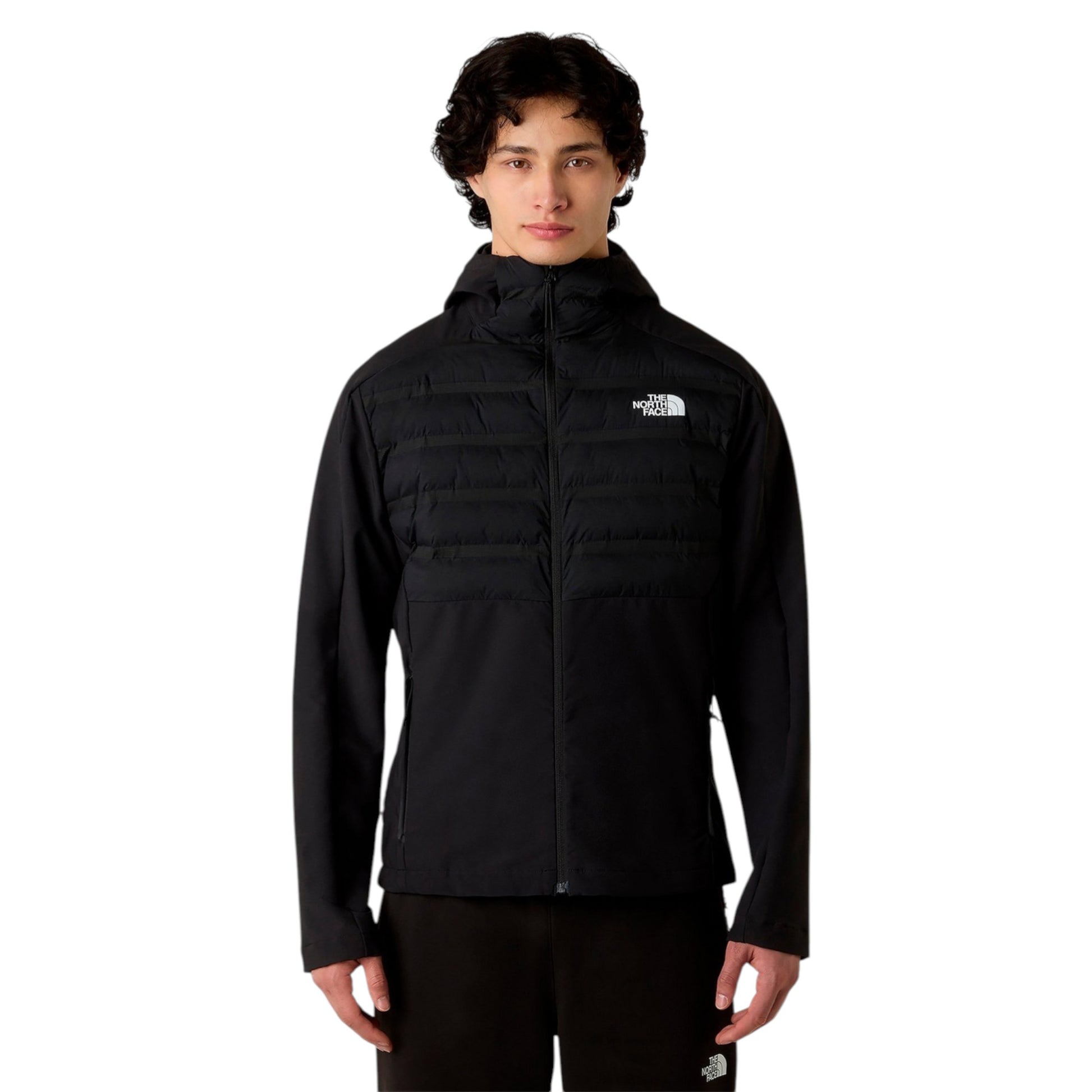 Person wearing a black jacket with a brand logo on a white background