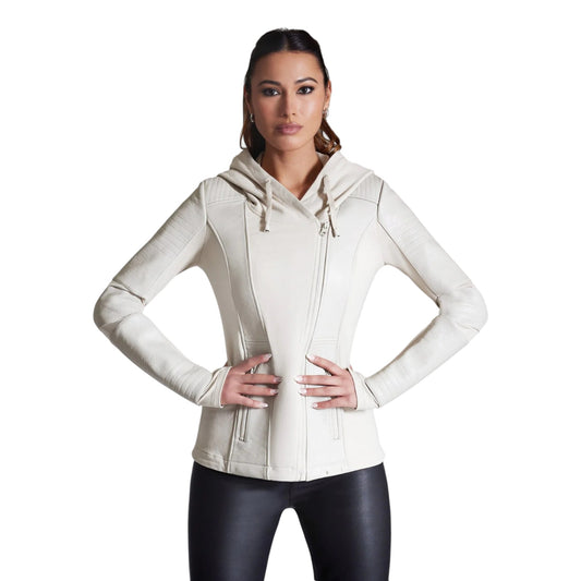 Woman wearing a beige hoodie with a white background