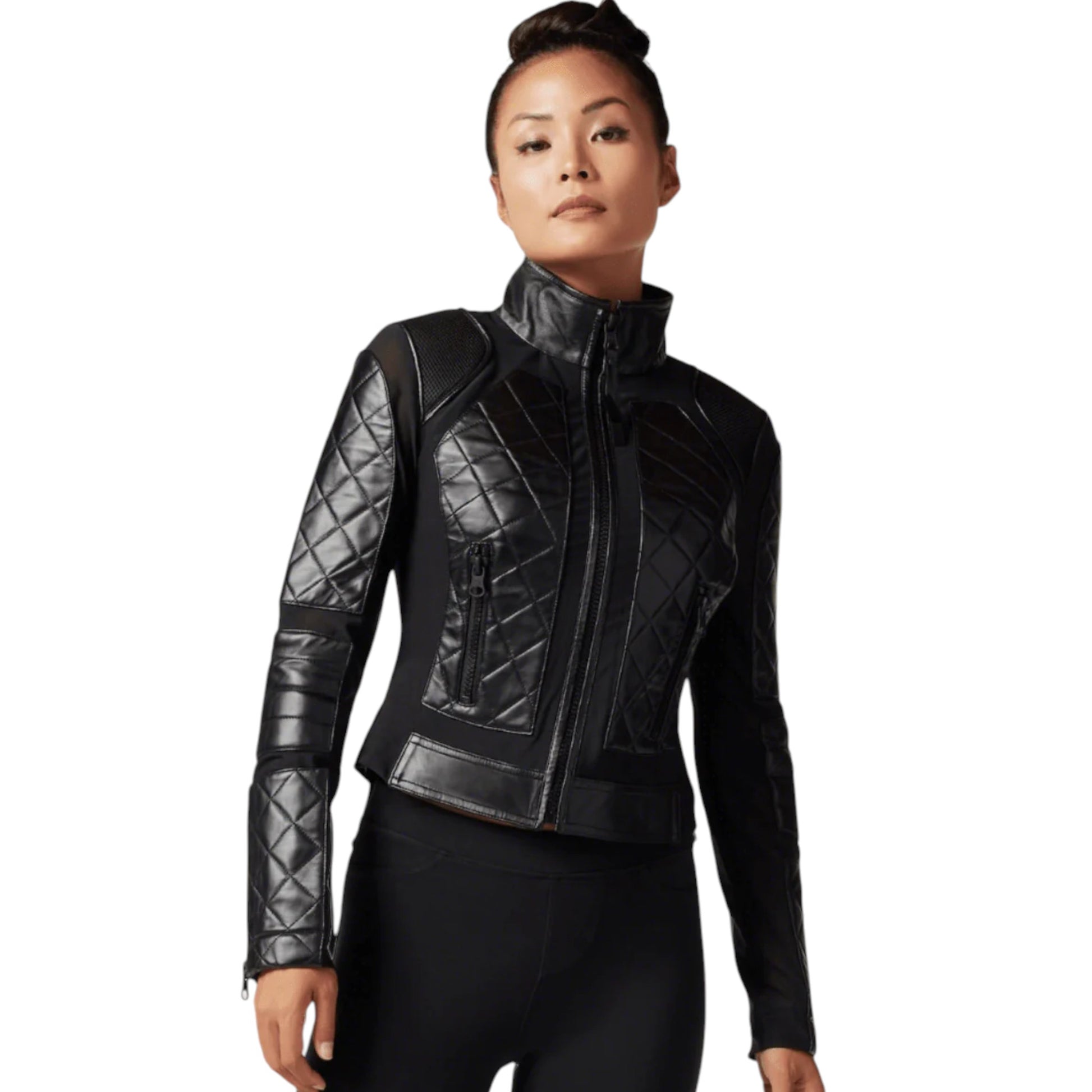 Woman wearing a black quilted jacket on a white background